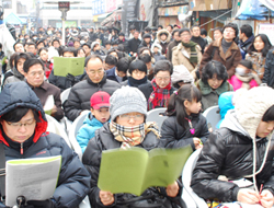 고난함께 성탄예배…용산참사 현장서 예수 맞이해